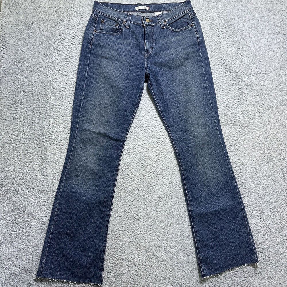 Levis 515 Jeans Sz 10 L Bootcut Mid Rise Medium‎ Wash Pocket Blue Denim Raw Hem